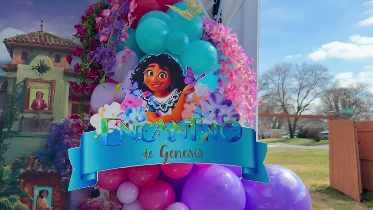 Colorful Encanto themed balloon detail and custom sign